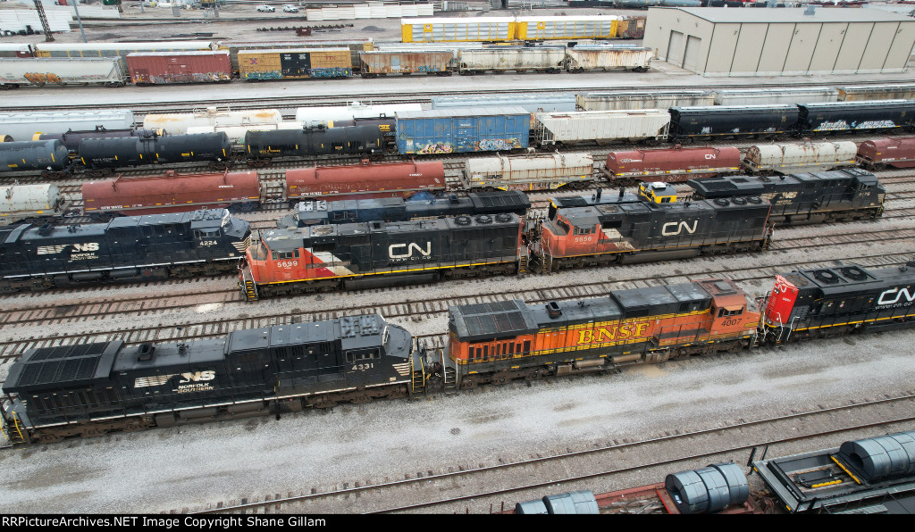 CN 5699 And other's sit in the Trra yard.